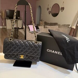Chanel medium black caviar double flap bag